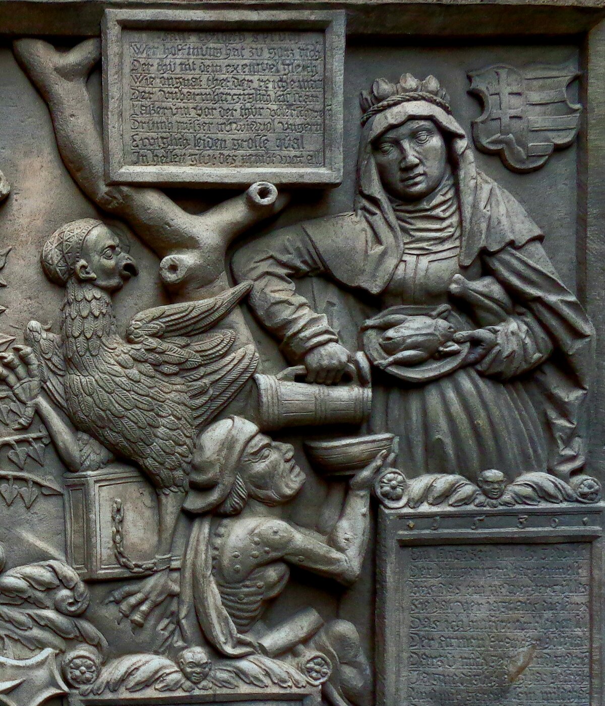 Sv. Elizabete no Tīringenes (1207–1231) rūpēs par mēra slimo.
Reljefs, fragments, meistars nezināms, 1542, Landgrāfa pils, Marburga Landgrafenschloss Marburg
© Foto Andris Levans, 2018