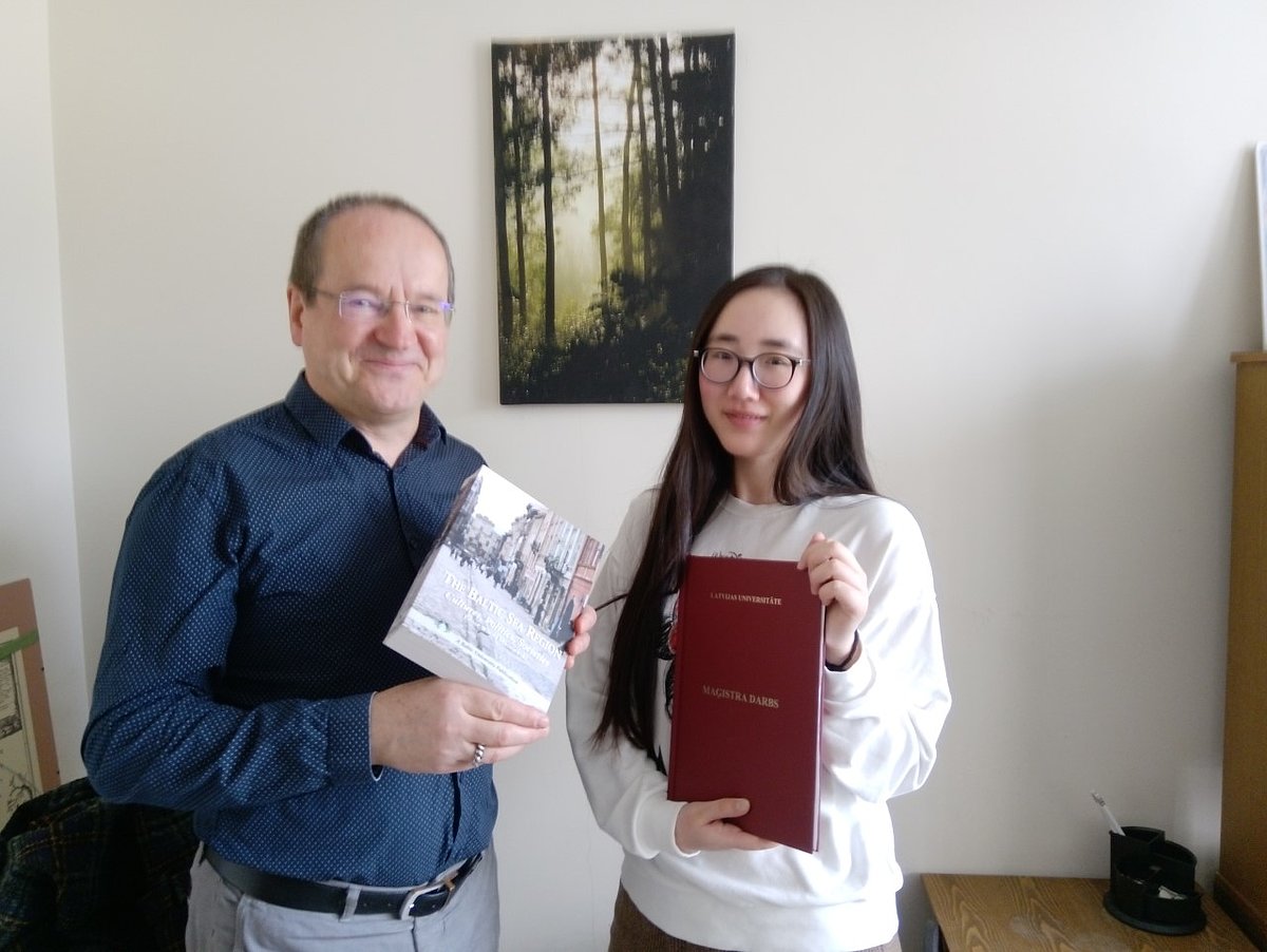Shan and the programme director prof. Valdis Muktupāvels