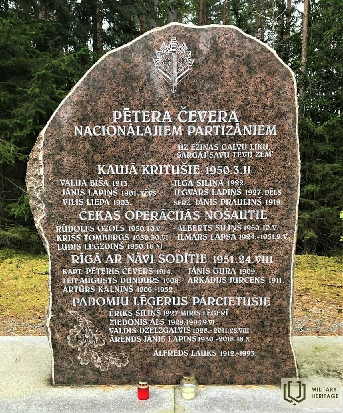 Pētera Čevera nacionālo partizānu piemiņas akmens Vadzenes mežā pie Vandzenes-Upesgrīvas ceļa. Foto: https://militaryheritagetourism.info/lv/military/stories/view/281?4 Pētera Čevera nacionālo partizānu piemiņas akmens Vadzenes mežā pie Vandzenes-Upesgrīvas ceļa. Foto: https://militaryheritagetourism.info/lv/military/stories/view/281?4